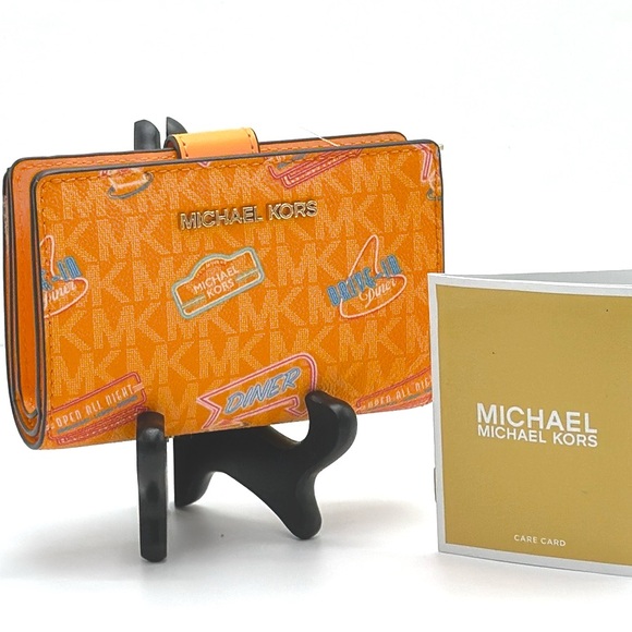 Michael Kors Jet Set Travel Medium Printed Signature Logo Bi-Fold 
Pop Orange - Picture 1 of 14